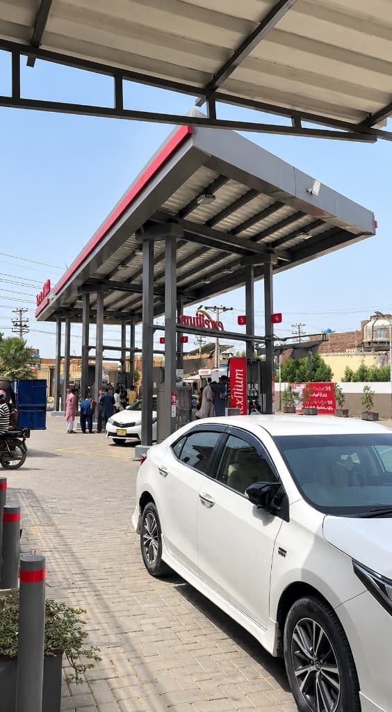 Active fuel dispensing at Mashaal Total PARCO station on Khanpur Road